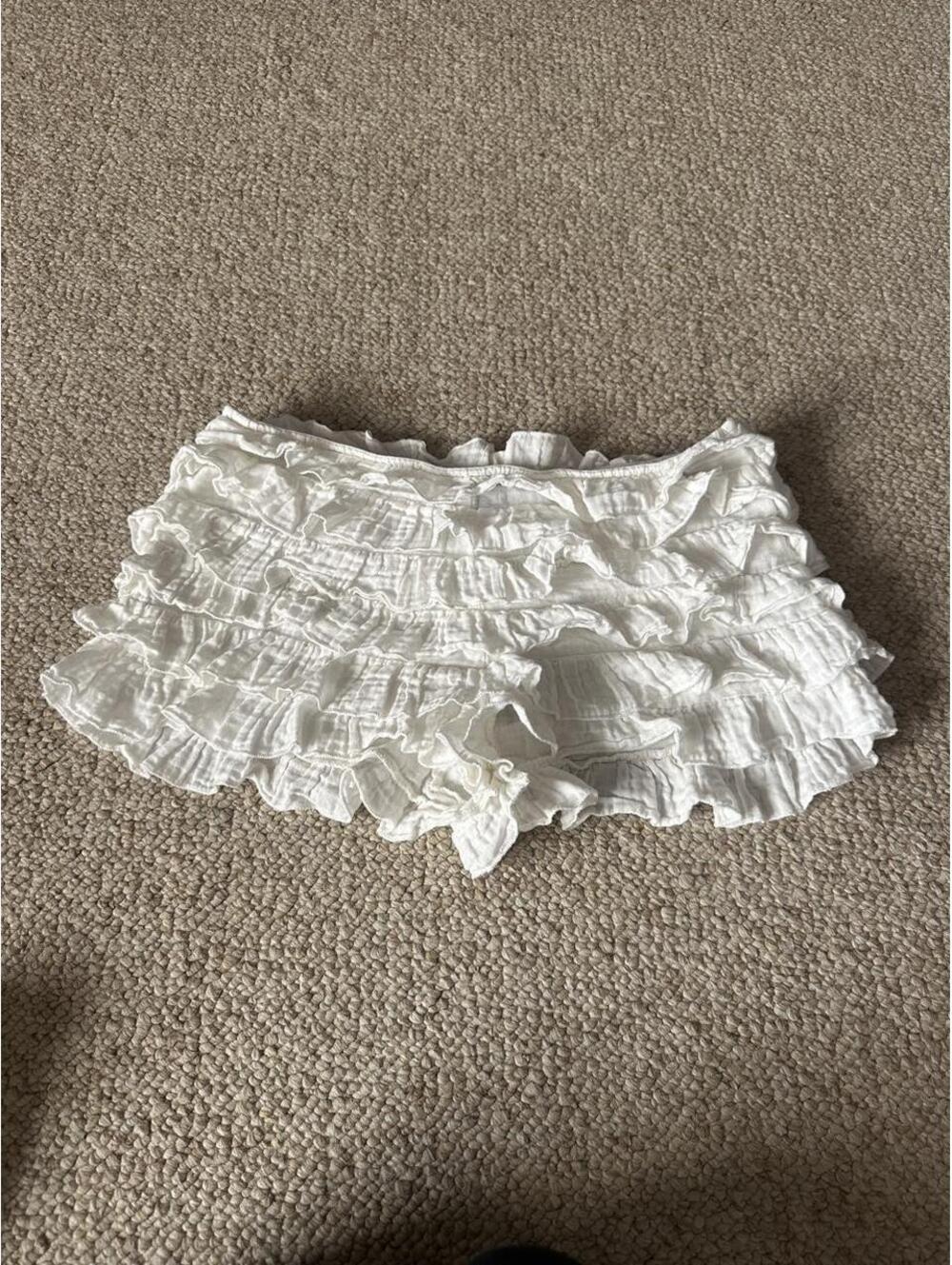 Ego Official White ruffled mini shorts